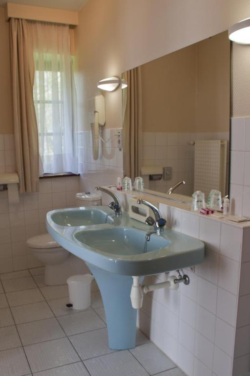 Tromcourt Hotel Couvin Kamer foto